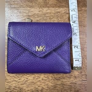 Michael Kors Vibrant Purple Pebbled Lester Tri fold Wallet